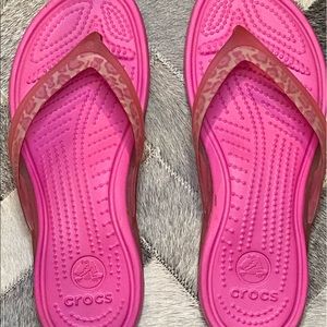 Crocs pink flip flops size 8